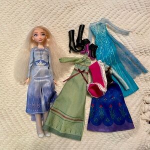 Elsa doll that sings with extra clothes